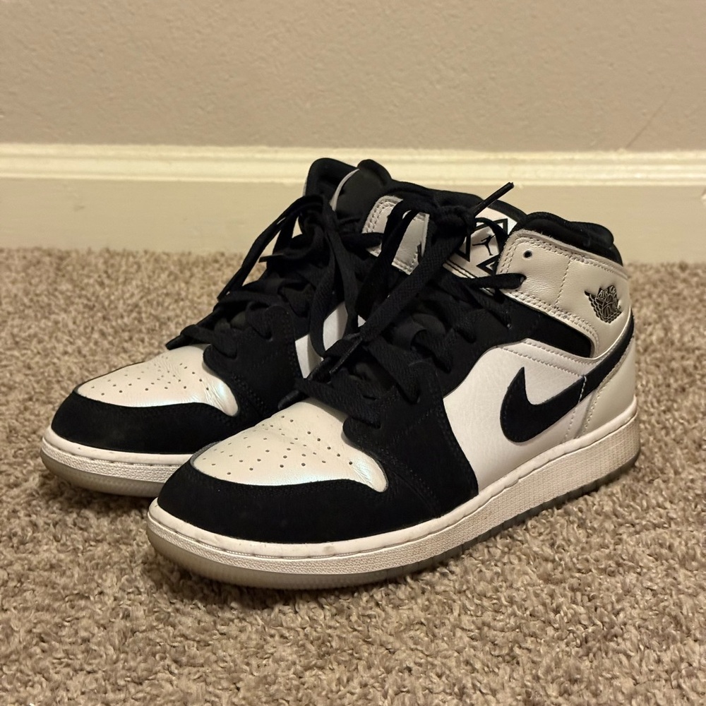 Nike Air Jordan Black and White Mid Sneakers